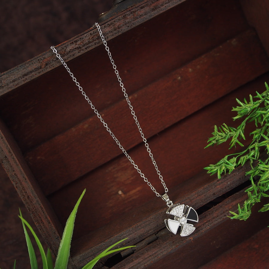 Stainless Steel Gold/Silver Plated Black and White Spinning Wheel Pendent Necklace