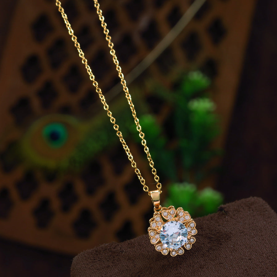 Stainless Steel Gold Plated Floral Spinning Pendent Necklace